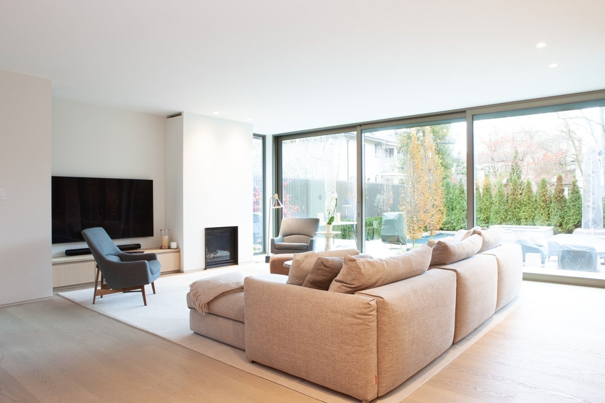 First floor of modern home renovation in Toronto with floor-to-ceiling windows