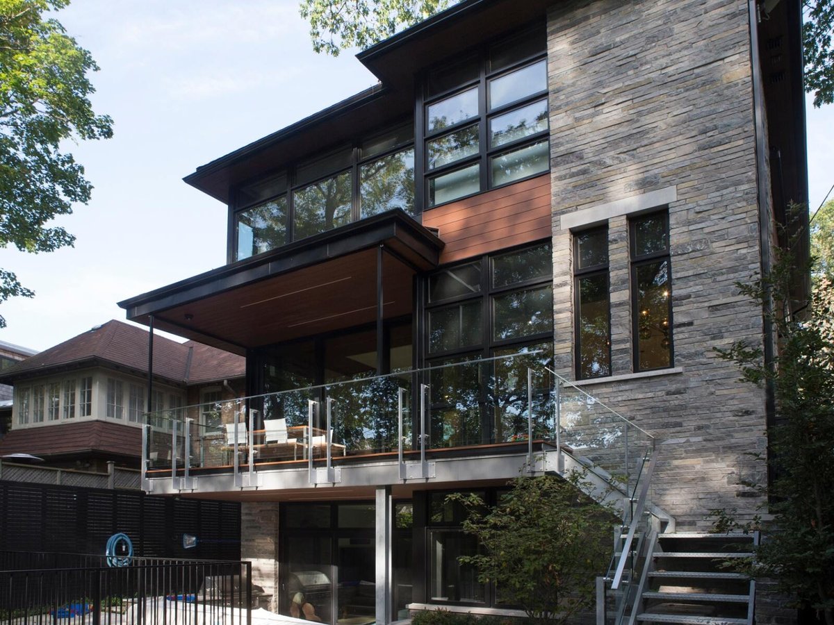 stone custom home backyard exterior